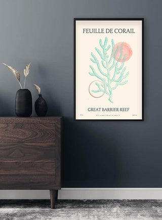 Feuille De Corail no. 02 poster with coral illustration, displayed above a dark wooden dresser in a modern living room.