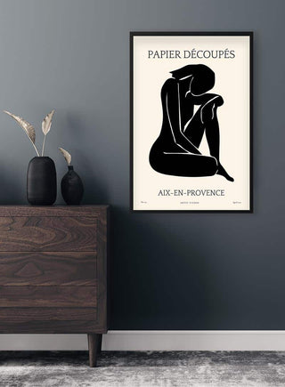 Papier Decoupe No. 05 Plakat til Stuen poster showing a minimalist black silhouette of a seated figure.