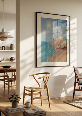 Leaving the sea by NeReid in a black frame in a bright dining room with wooden chairs