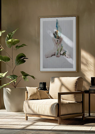 Letargo I by Rocio Montoya framed above a beige armchair beside a potted plant