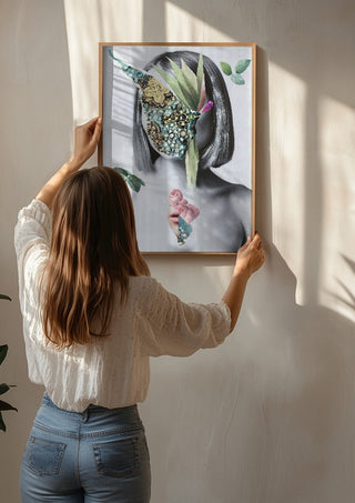 The color of fresh roses by Rocio Montoya being hung on a sunlit wall