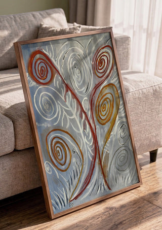 Coil by Fábio Diniz Art in a walnut frame leaning against a grey sofa