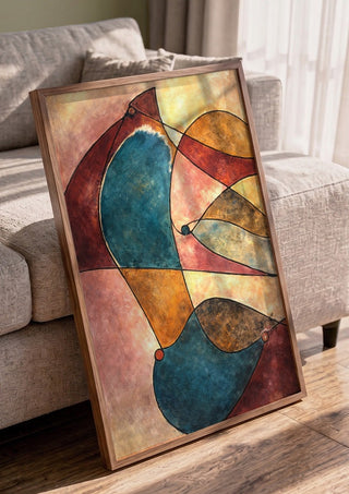 When Doves Cry by Art Guveau in a walnut frame leaning against a grey sofa
