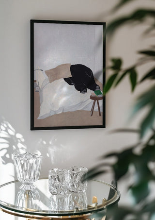 Dream department by Jaron Su in a black frame above a glass table with crystal glassware