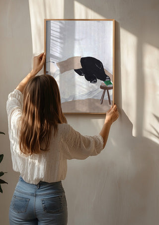 Dream department by Jaron Su being hung on a sunlit wall