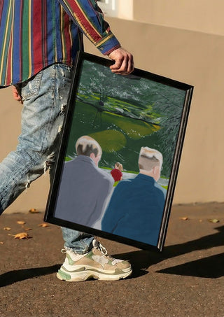 Koselig by Jaron Su carried in a black frame along a sunny street