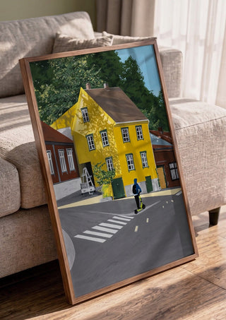 Low sun forever by Jaron Su in a walnut frame leaning against a grey sofa