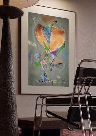Butterfly by Art Guveau framed in a dim room beside a tubular steel chair