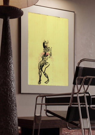 Gift by Alice Ruja framed in a dim room beside a tubular steel chair
