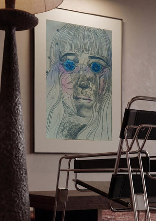 Awe by Alice Ruja framed in a dim room beside a tubular steel chair