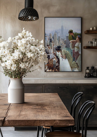 Manhattan View by Dikhotomy in a black frame above a rustic table with white flowers