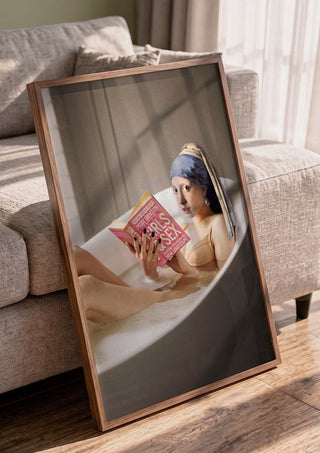 Chillin Time by Dikhotomy in a walnut frame leaning against a grey sofa