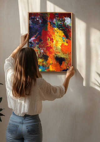Red Abstract by René J being hung on a sunlit wall