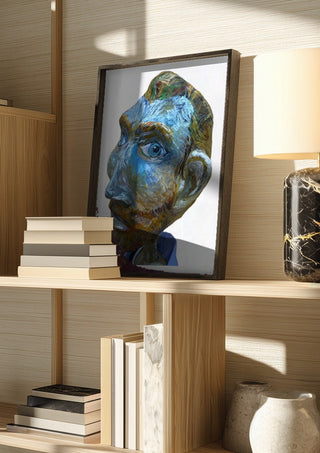 Vincent by Simone Hübner-Schwinn in a dark frame on a wooden shelf beside books and a lamp