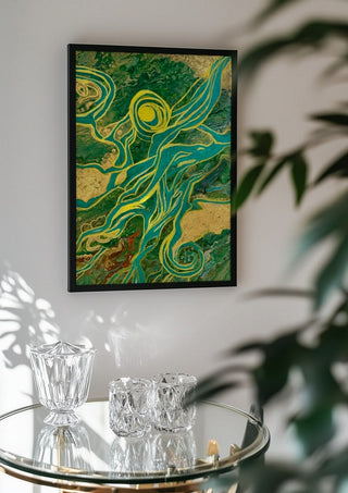 Golden Vines by Da Winters in a black frame above a glass table with crystal glassware