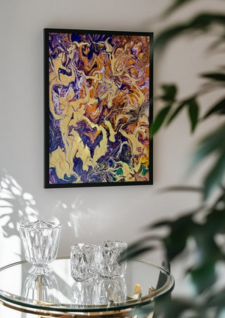 Cream and Amethyst by Da Winters in a black frame above a glass table with crystal glassware