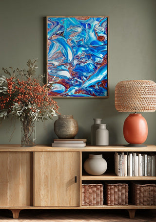 Blue Waves by Da Winters above a wooden sideboard on a sage green wall