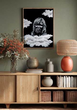 innocence by Sofia de Lemos above a wooden sideboard on a sage green wall
