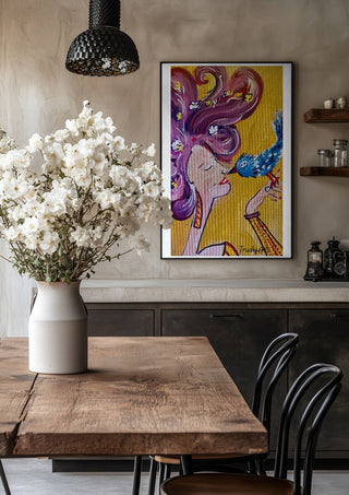 Vogelfrei by Trude in a black frame above a rustic table with white flowers