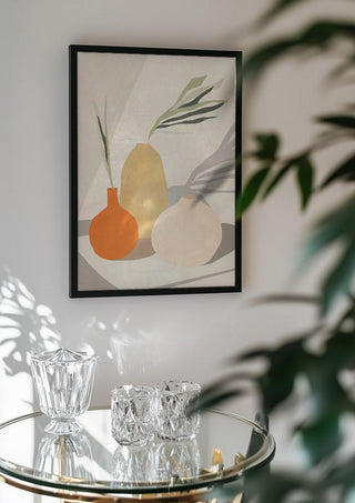 Vases 2 by ThingDesign in a black frame above a glass table with crystal glassware