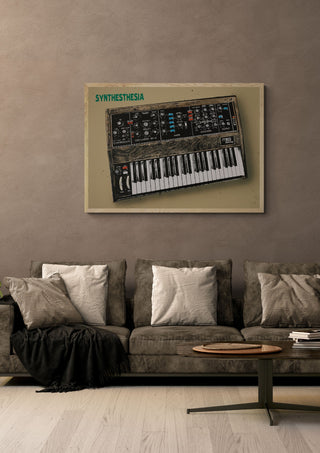 Synthesthesia by Carl Smith ART in a light oak frame above a grey sofa on a warm brown wall