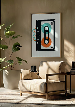 Mixtape by Bo Lundberg framed above a beige armchair beside a potted plant