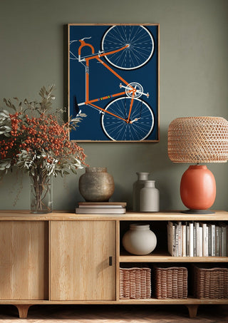 Swedish Racing Bike by Bo Lundberg above a wooden sideboard on a sage green wall