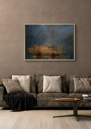 Boats in the Mist by Justyna Kopania in a light oak frame above a grey sofa on a warm brown wall
