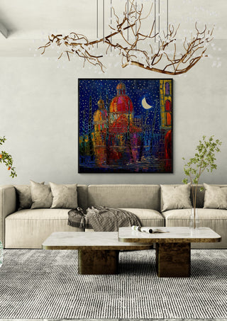 Domes under the Moon by Justyna Kopania in a black frame above a cream sofa under a branch chandelier