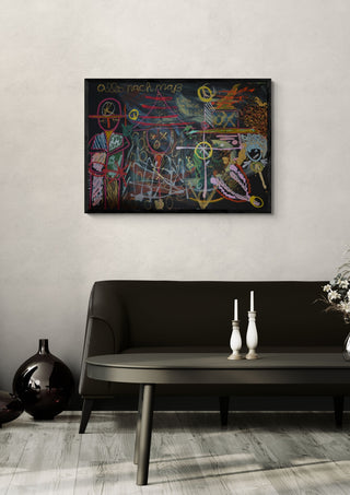 Alles nach Maß by Ali Kasap in a black frame above a dark sofa with candlesticks on a round table
