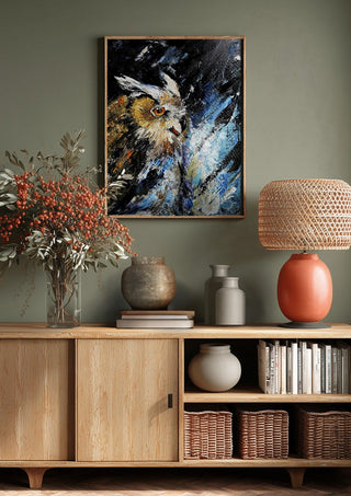 Silent wisdom by Lüba above a wooden sideboard on a sage green wall