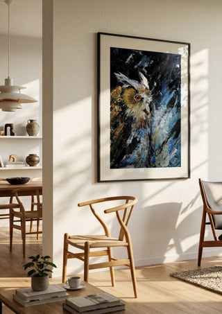 Silent wisdom by Lüba in a black frame in a bright dining room with wooden chairs