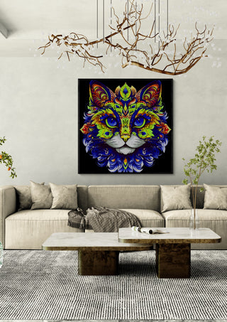 The Ornamental Cat by BunteBeute in a black frame above a cream sofa under a branch chandelier