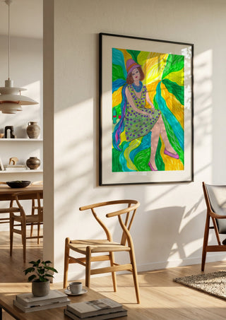 The Lilac Hat by Camilla Nilsson in a black frame in a bright dining room with wooden chairs