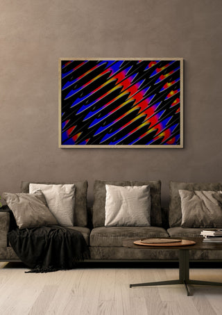 The Magic of Colors by Walter Zettl in a light oak frame above a brown sofa with cushions