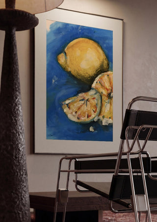 Summer by Christin framed in a dim room beside a tubular steel chair