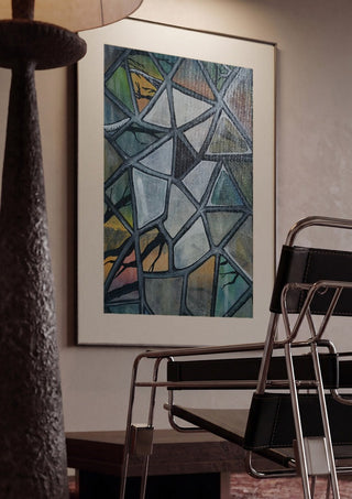 Cracked Glass by Fredprikas framed in a dim room beside a tubular steel chair