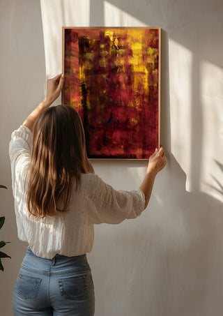 Einmal um die Welt by Sophie Schillen being hung on a sunlit wall