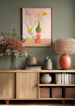Crocus on pedestal by Creationsbyeditabrus above a wooden sideboard on a sage green wall