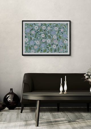 Sage Winter by Rebecca Wright in a black frame on a pale wall above a dark sofa with candlesticks