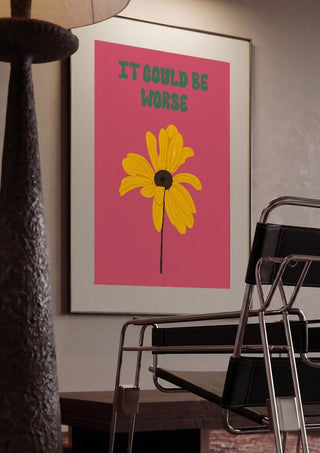 It Could Be Worse by Jakob Falkenberg framed in a dim room beside a tubular steel chair