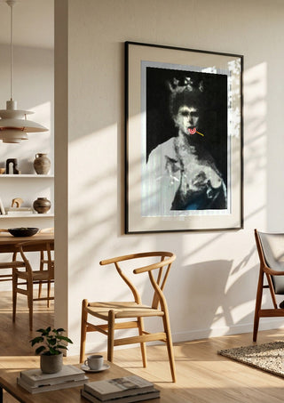 The Midnight Queen by Bent Hardervig in a black frame in a bright dining room with wooden chairs