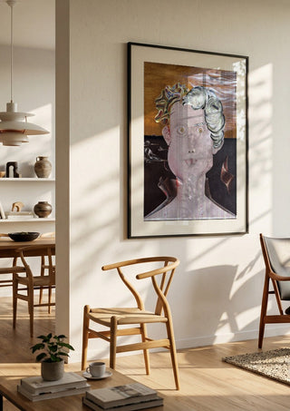 Looksmaxxer Deluxe by Emil Walli in a black frame in a bright dining room with wooden chairs
