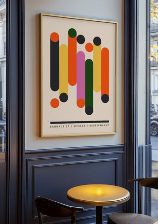 Bauhaus Columns by Neil Stevens in an oak frame on a panelled cafe wall