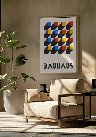 Bauhaus Grid by Neil Stevens framed above a beige armchair beside a potted plant