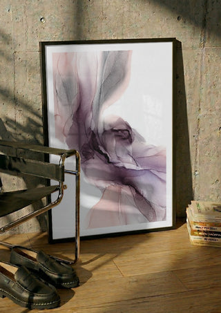 Spring Melody by Anna Dormir in a black frame leaning against a concrete wall by a steel chair
