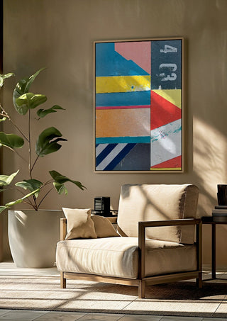 403 by Kareem Rizk framed above a beige armchair beside a potted plant