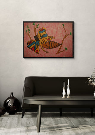 EGO fallenlassen by Olaf Baier in a black frame above a dark sofa with candlesticks