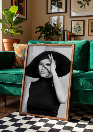Back in time by Bettinafloorphoto in a wooden frame leaning against a green velvet sofa on a chequered floor
