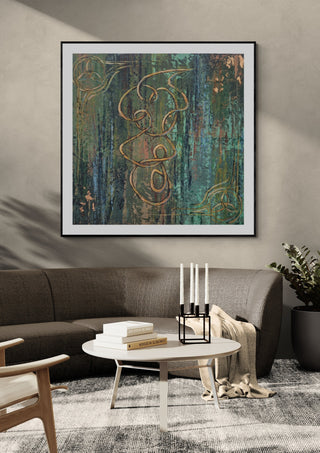 Irish mood by Dina in a black frame above a dark grey sofa with a round table and candlesticks